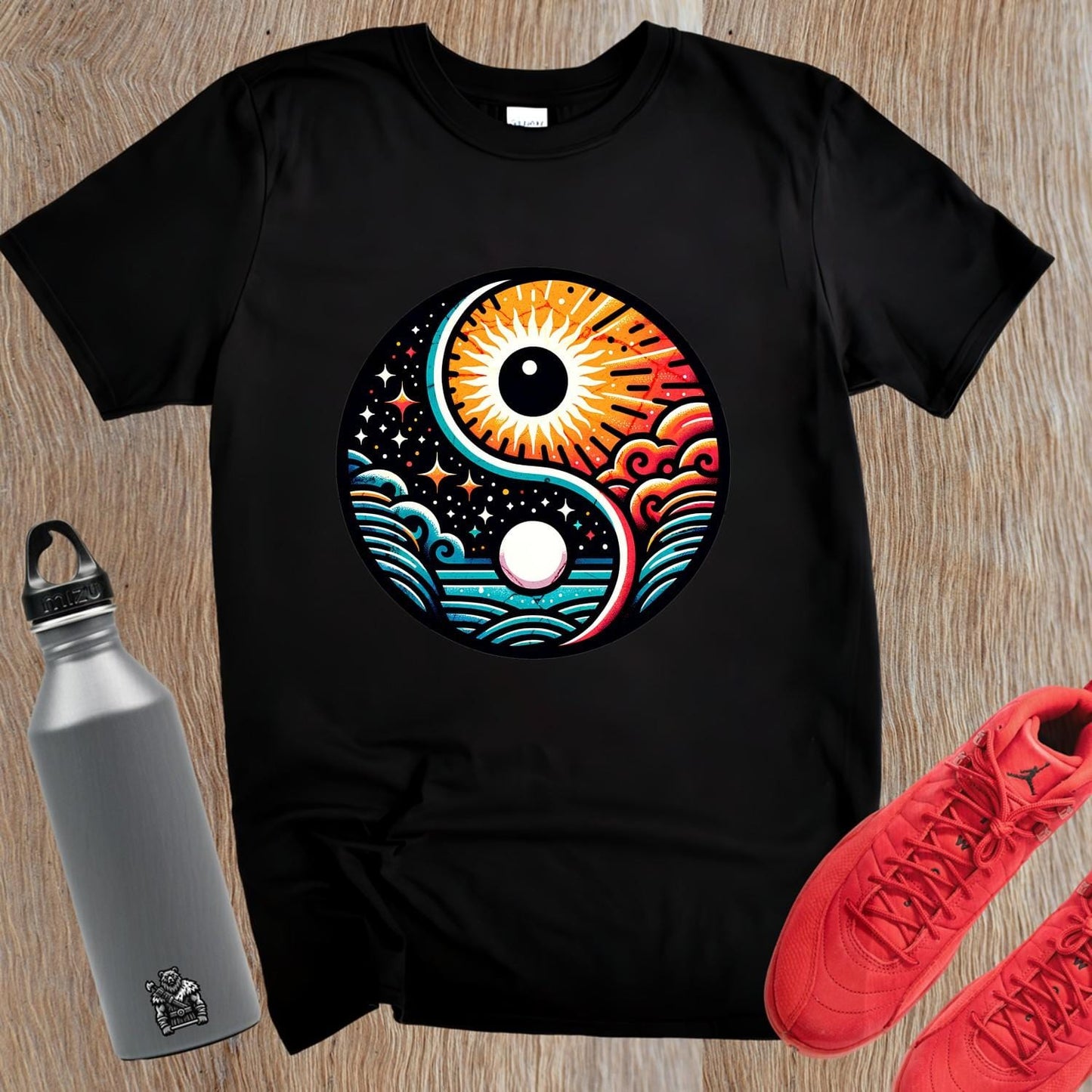 "Vibrant gym T-shirt featuring a bold yin-yang design with sun and moon elements, symbolizing harmony and strength for fitness enthusiasts."