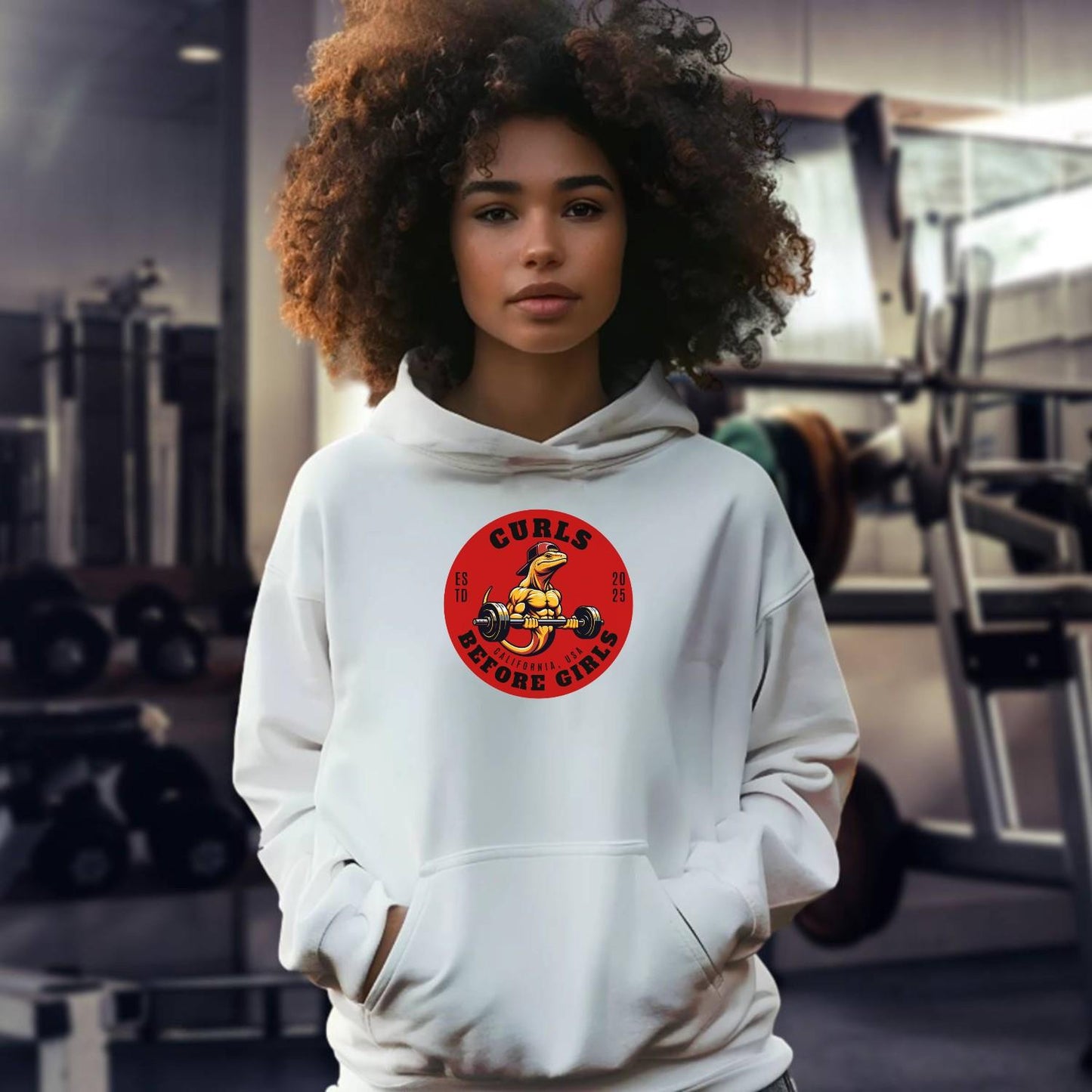 "Graphic hoodie featuring 'Curls Before Girls' slogan, vibrant design for fitness enthusiasts, perfect for gym and casual wear."