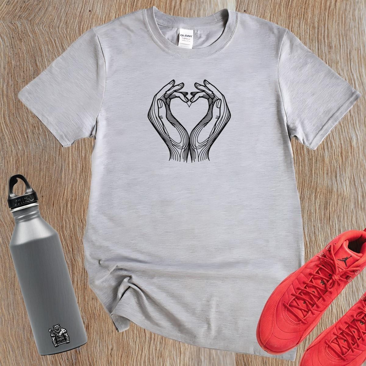 "Heart Hands T-Shirt featuring a bold heart design created by two hands, perfect for gym workouts and casual fitness wear."