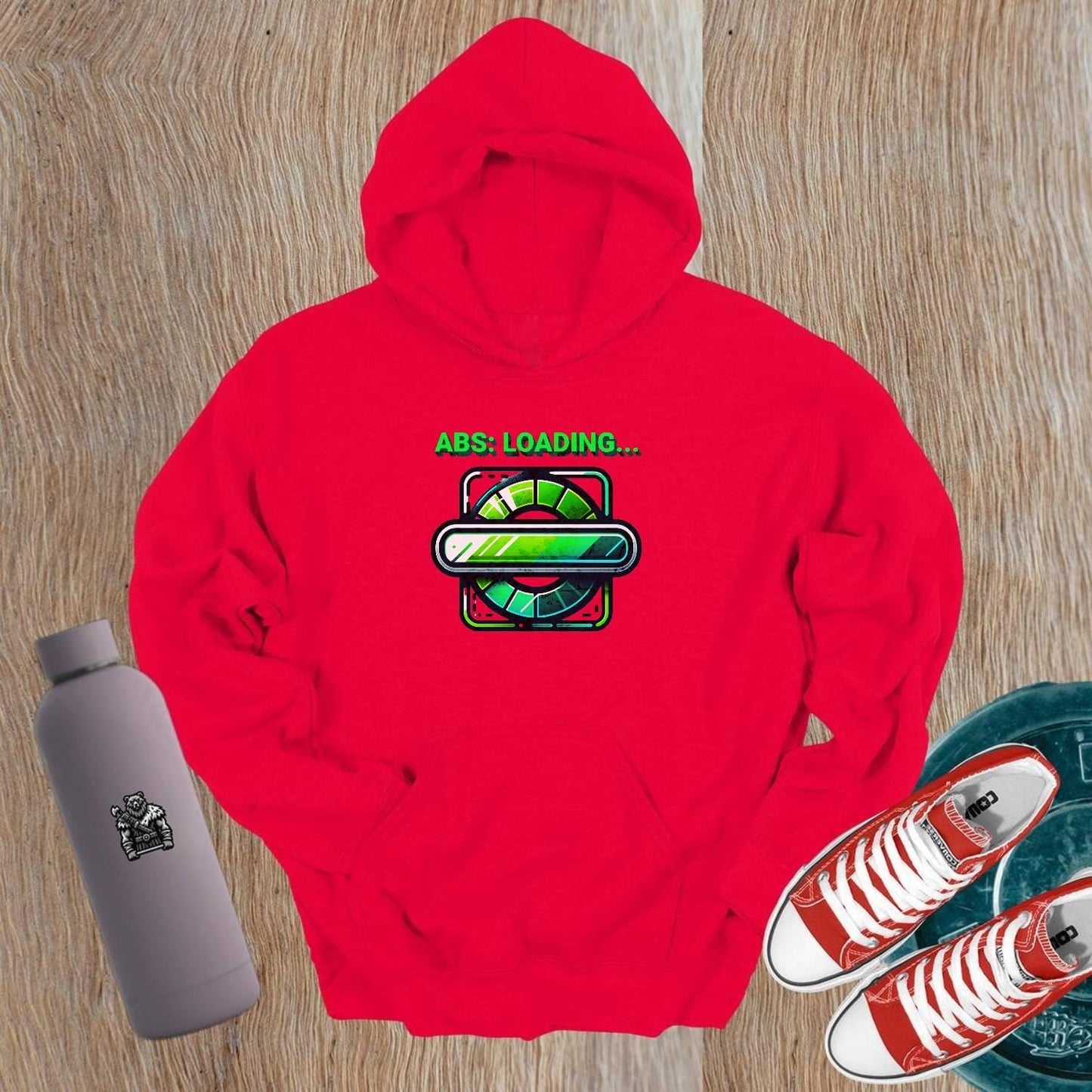 Alt text: "Vibrant gym hoodie featuring 'ABS: LOADING...' graphic, perfect for fitness enthusiasts. Ideal for workouts and casual wear."