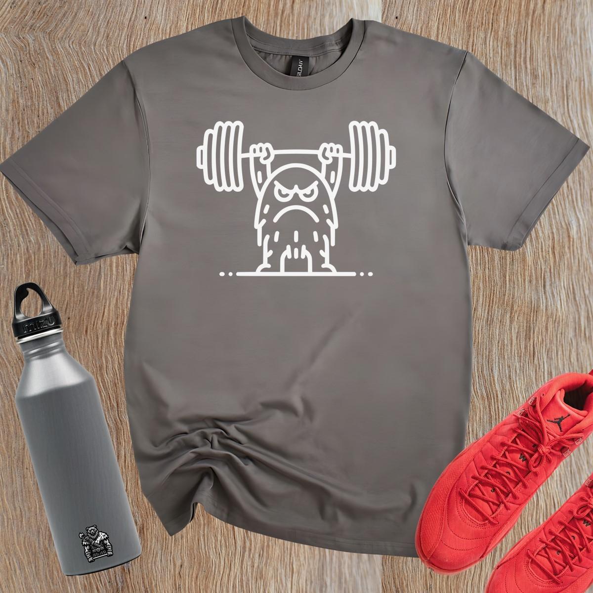 "Bold gym T-shirt featuring a fierce weightlifting monster design. Ideal for fitness enthusiasts, showcasing strength and motivation."