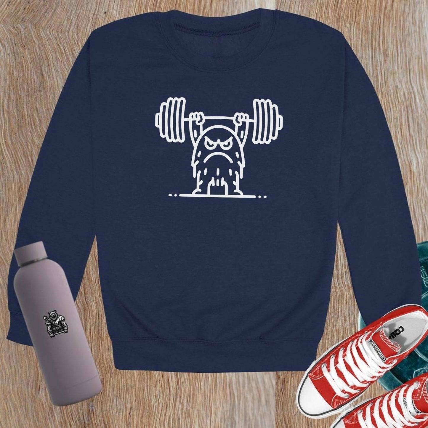 Alt text: "Bold gym crewneck sweatshirt featuring a gritty weightlifter graphic, perfect for workouts and lounging, ideal for fitness enthusiasts."