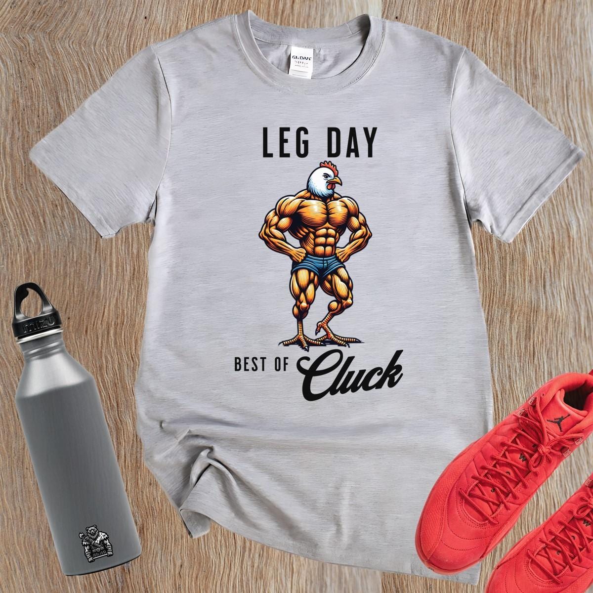 "Bold gym T-shirt featuring a unique muscular chicken design, perfect for fitness enthusiasts. Ideal for workouts, weightlifting, and cardio."