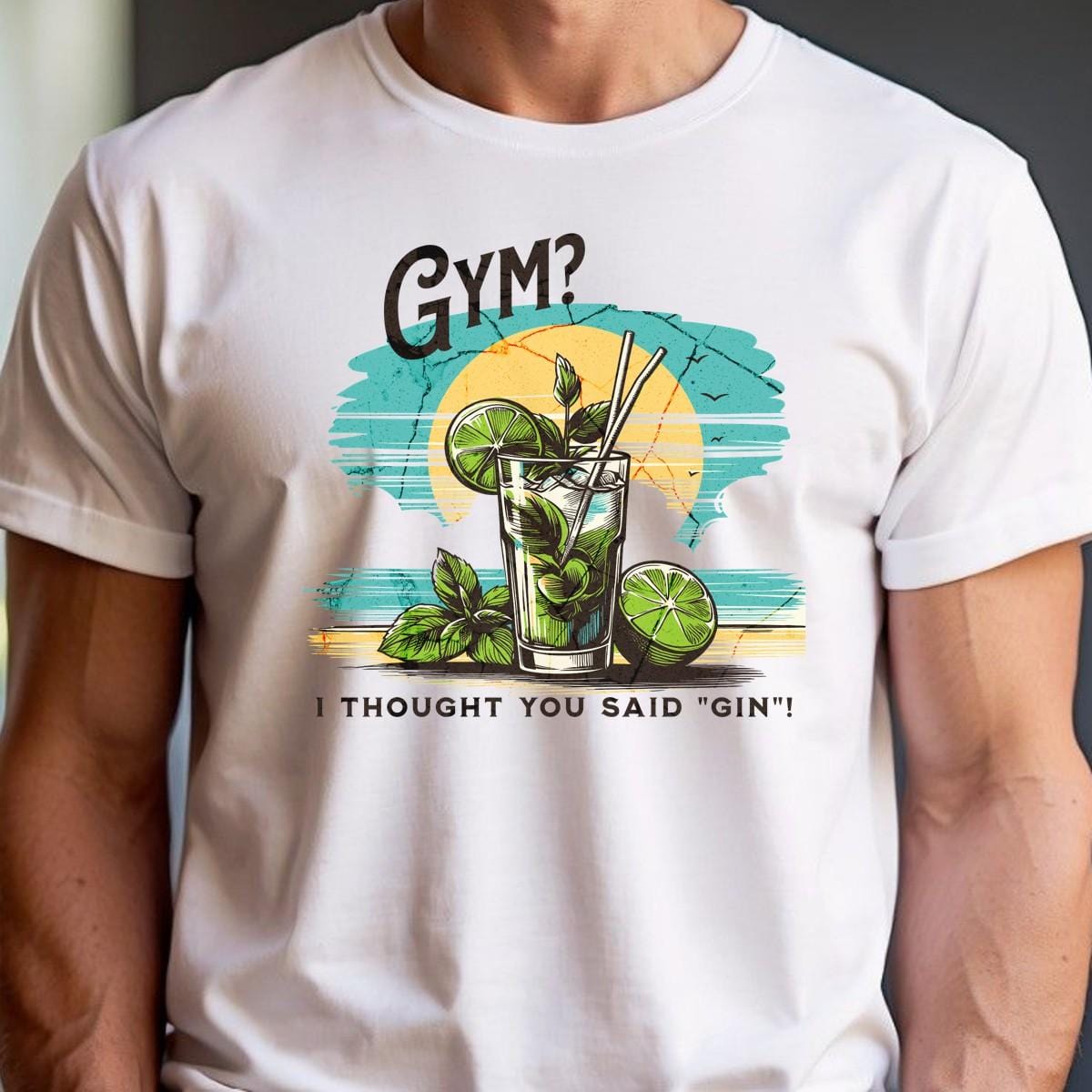 Alt text: "Fun graphic T-shirt featuring the humorous phrase 'GYM? I Thought You Said 'GIN'!' Perfect for fitness lovers and gym enthusiasts."