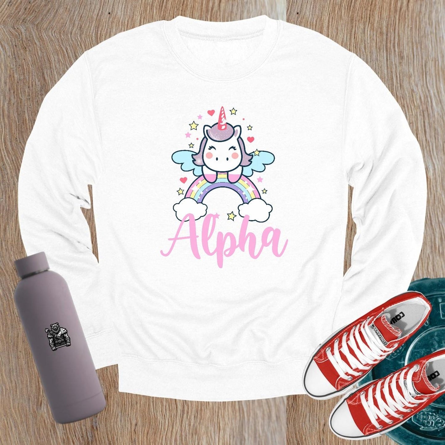 "Colorful Unicorn Alpha Sweatshirt with a playful unicorn soaring over a vibrant rainbow, designed for gym workouts and relaxation."