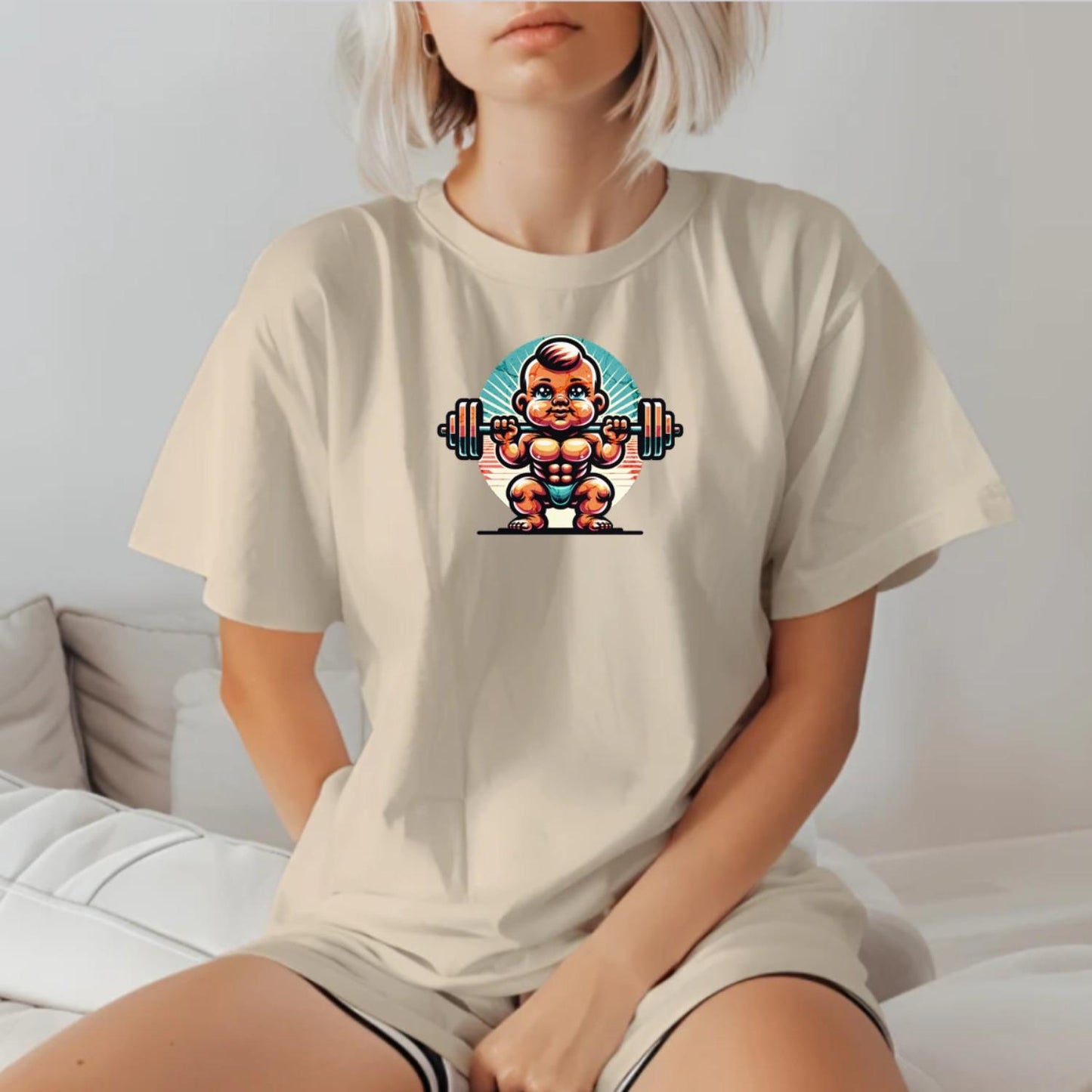 Alt text: "Baby Beast gym T-shirt design featuring a confident baby lifting weights with vibrant colors, perfect for fitness enthusiasts."