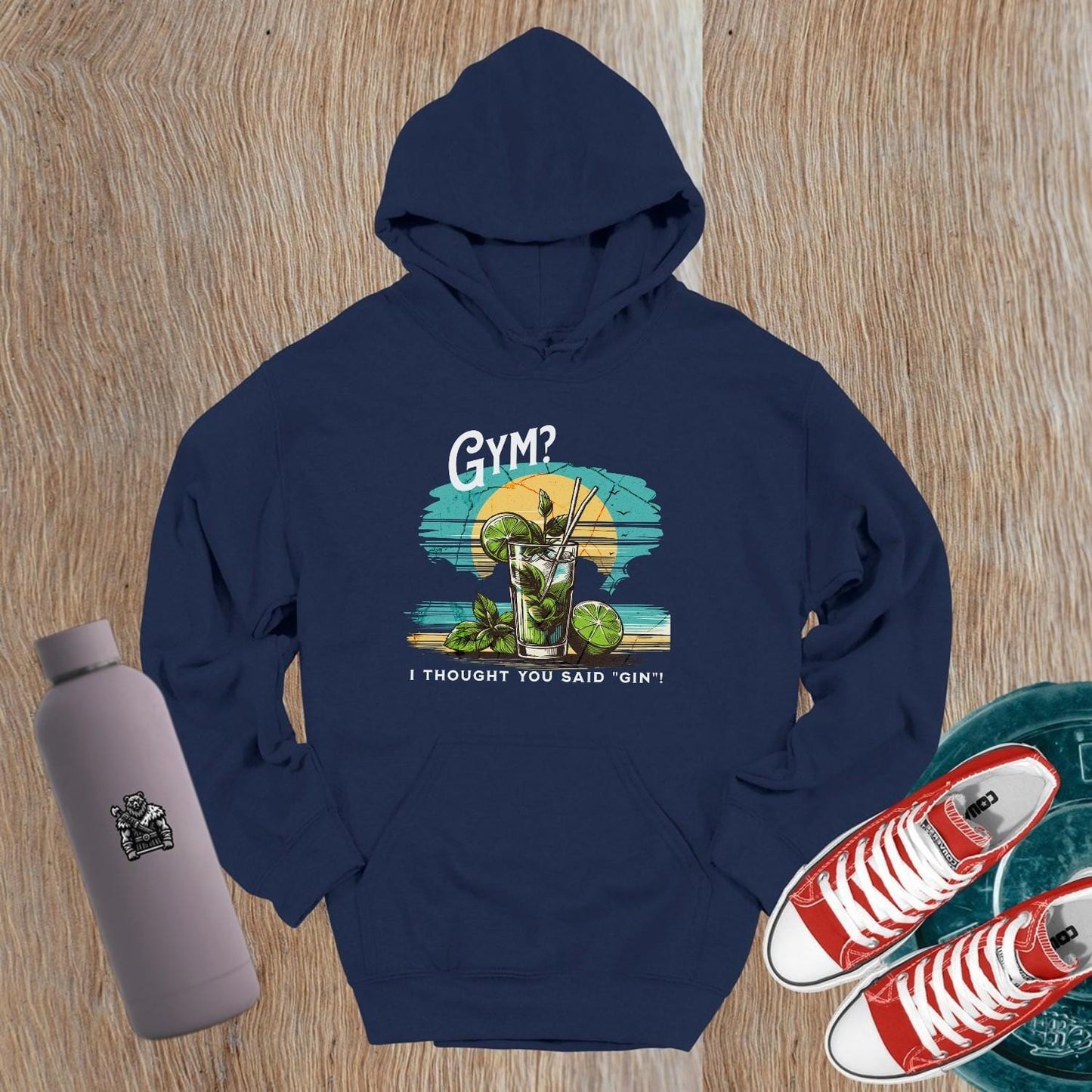 "Humorous 'Gym? I Thought You Said Gin' hoodie in vibrant colors, perfect for gym lovers and casual outings, showcasing playful style."