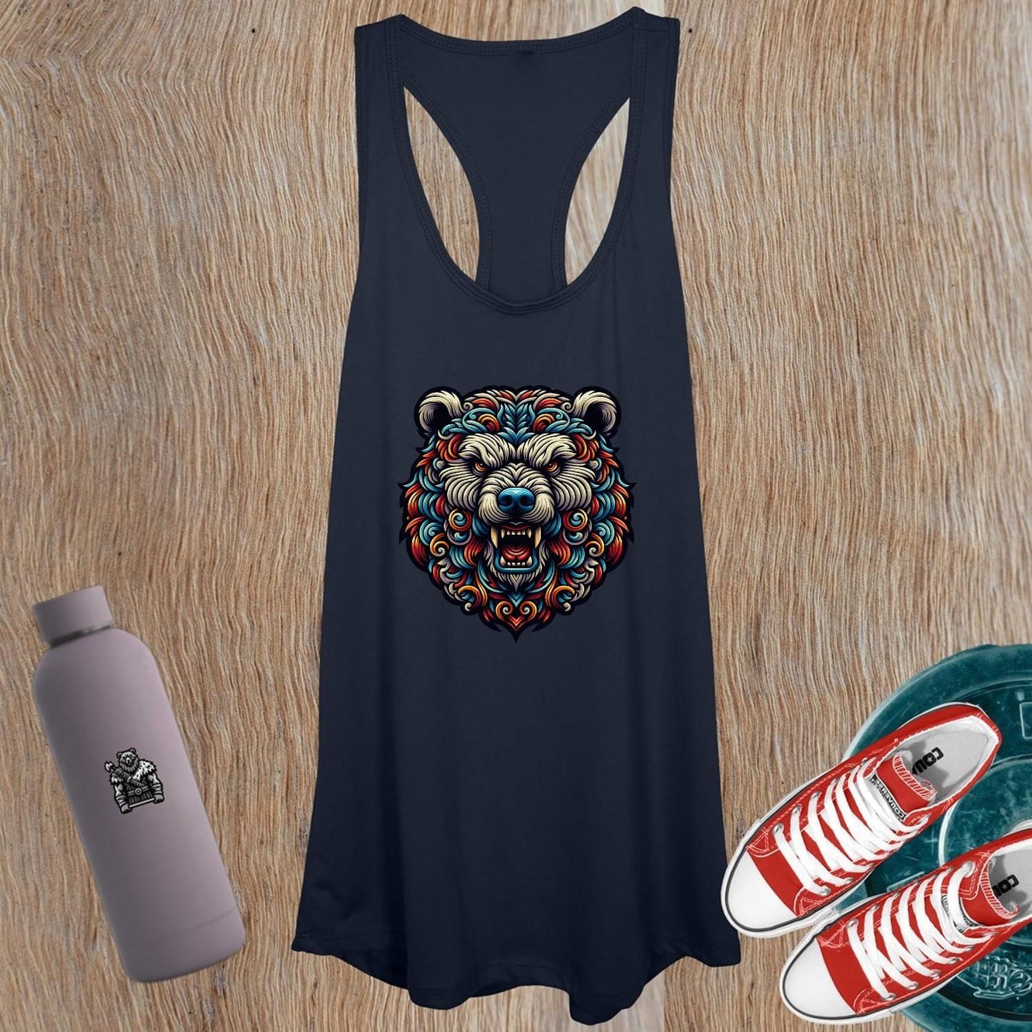 "Fierce women's tank top featuring a powerful bear graphic, perfect for workouts and casual outings. Showcases strength and confidence."