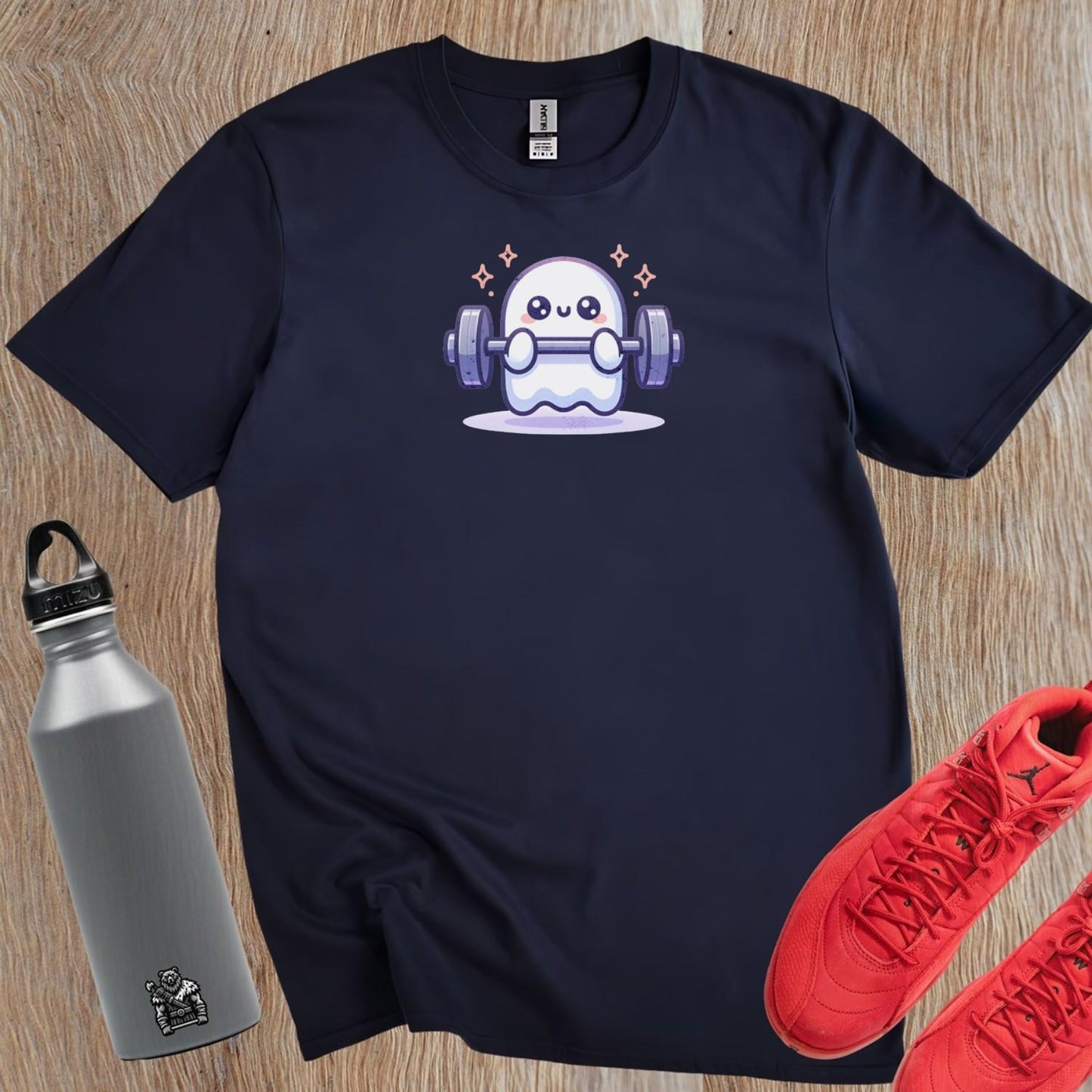 "Playful ghost lifting weights design on gym T-shirt, blending fitness motivation with whimsical charm for workout and casual wear."