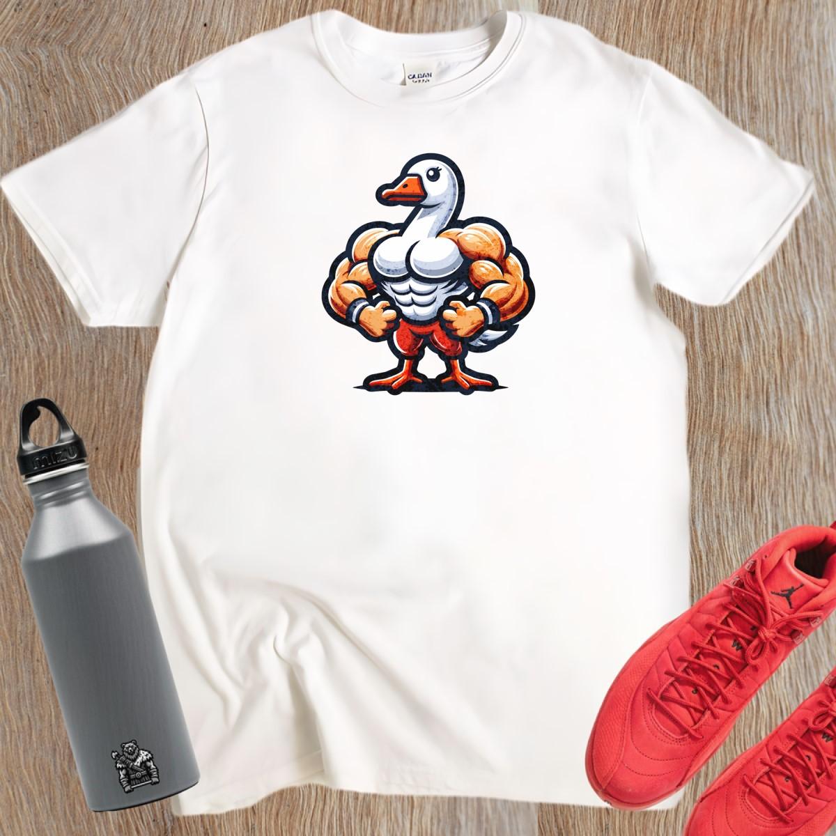 Alt text: "Muscular duck graphic T-shirt for gym enthusiasts, featuring a bold design that combines fun and fitness in a relaxed fit."