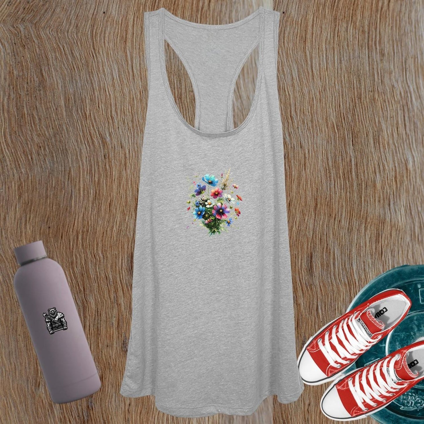 "Vibrant floral women's gym tank top showcasing a flattering fit for active wear, perfect for workouts and outdoor activities."