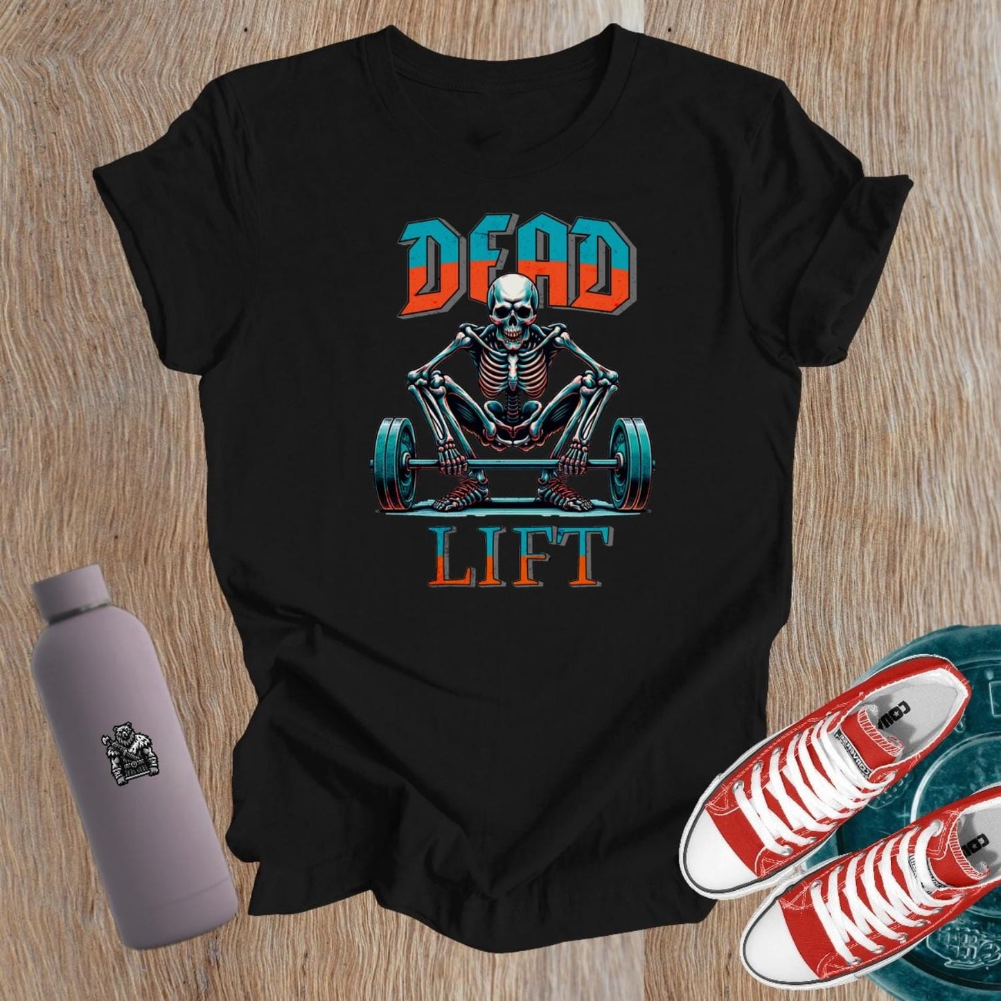 "Bold women's Dead Lift T-shirt featuring an edgy skeleton design, symbolizing strength and confidence for fitness enthusiasts in the gym."