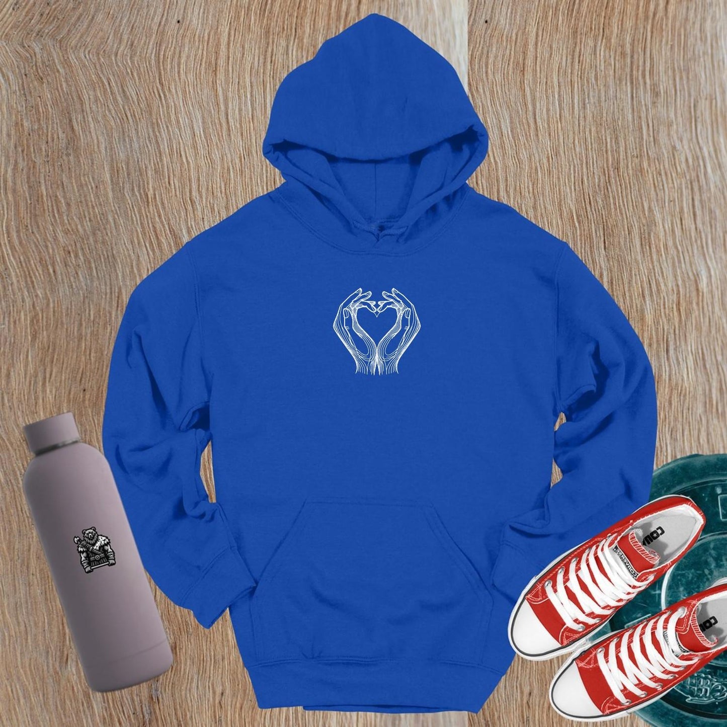 "Stylish gym hoodie with heart-shaped hand design symbolizing strength and unity, perfect for workouts and casual wear."