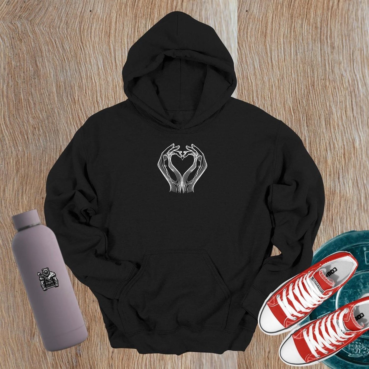 "Stylish gym hoodie with heart-shaped hand design symbolizing strength and unity, perfect for workouts and casual wear."