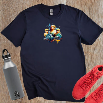 "Vibrant gym T-shirt featuring playful chicks lifting weights, showcasing a fun design for fitness enthusiasts. Perfect for workouts!"