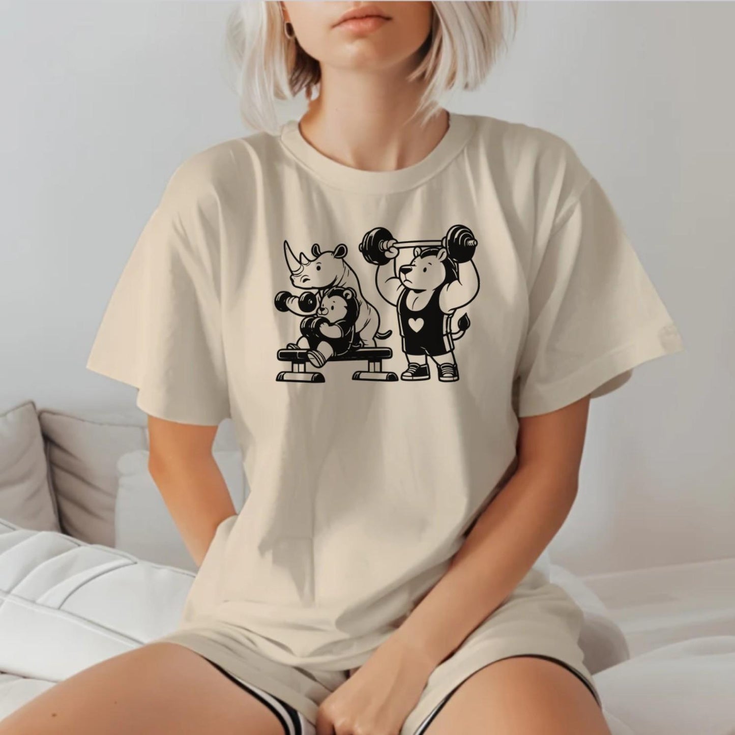 "Playful gym T-shirt featuring a trio of fitness-loving animals, combining fun and comfort for gym enthusiasts and workout motivation."