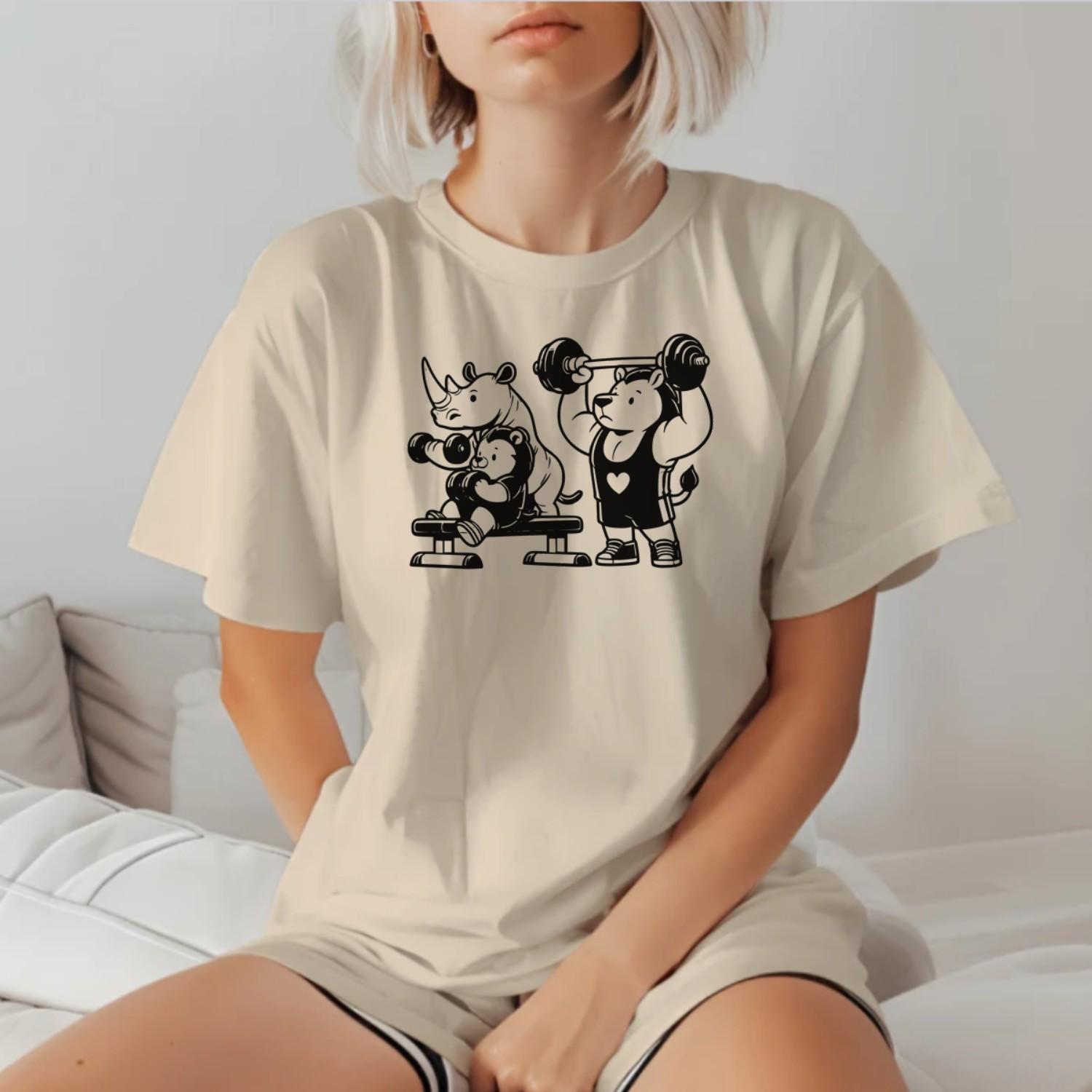 "Playful gym T-shirt featuring a trio of fitness-loving animals, combining fun and comfort for gym enthusiasts and workout motivation."