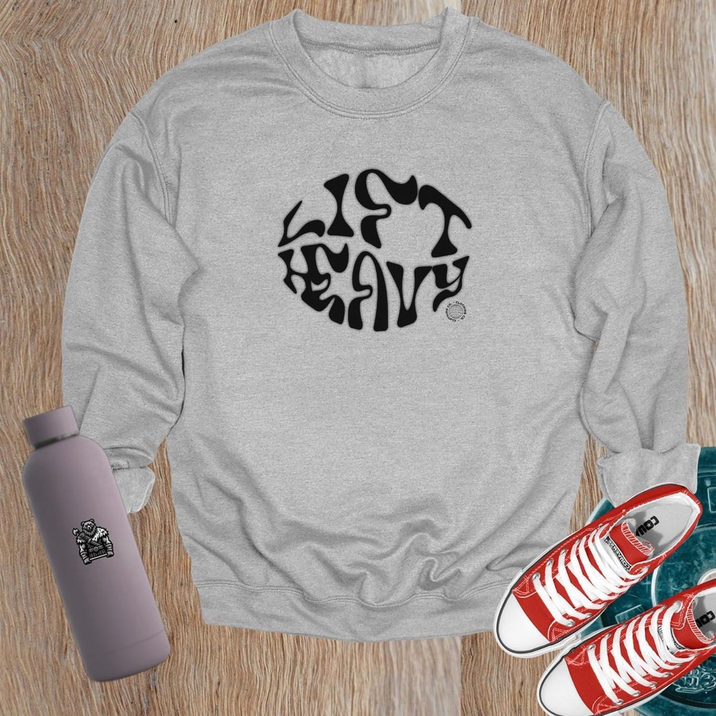 "Stylish gym crewneck sweatshirt with bold graphic design, perfect for workouts and casual outings, showcasing fitness motivation."