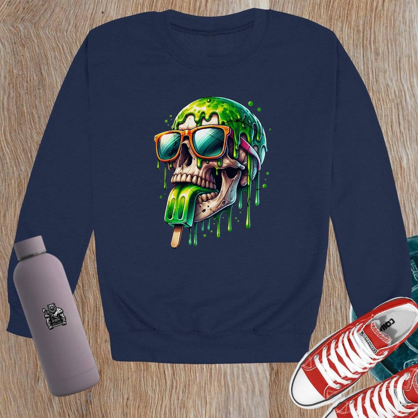 "Edgy crewneck sweatshirt with skull graphic in sunglasses and dripping popsicle, perfect for gym and casual wear, relaxed fit."