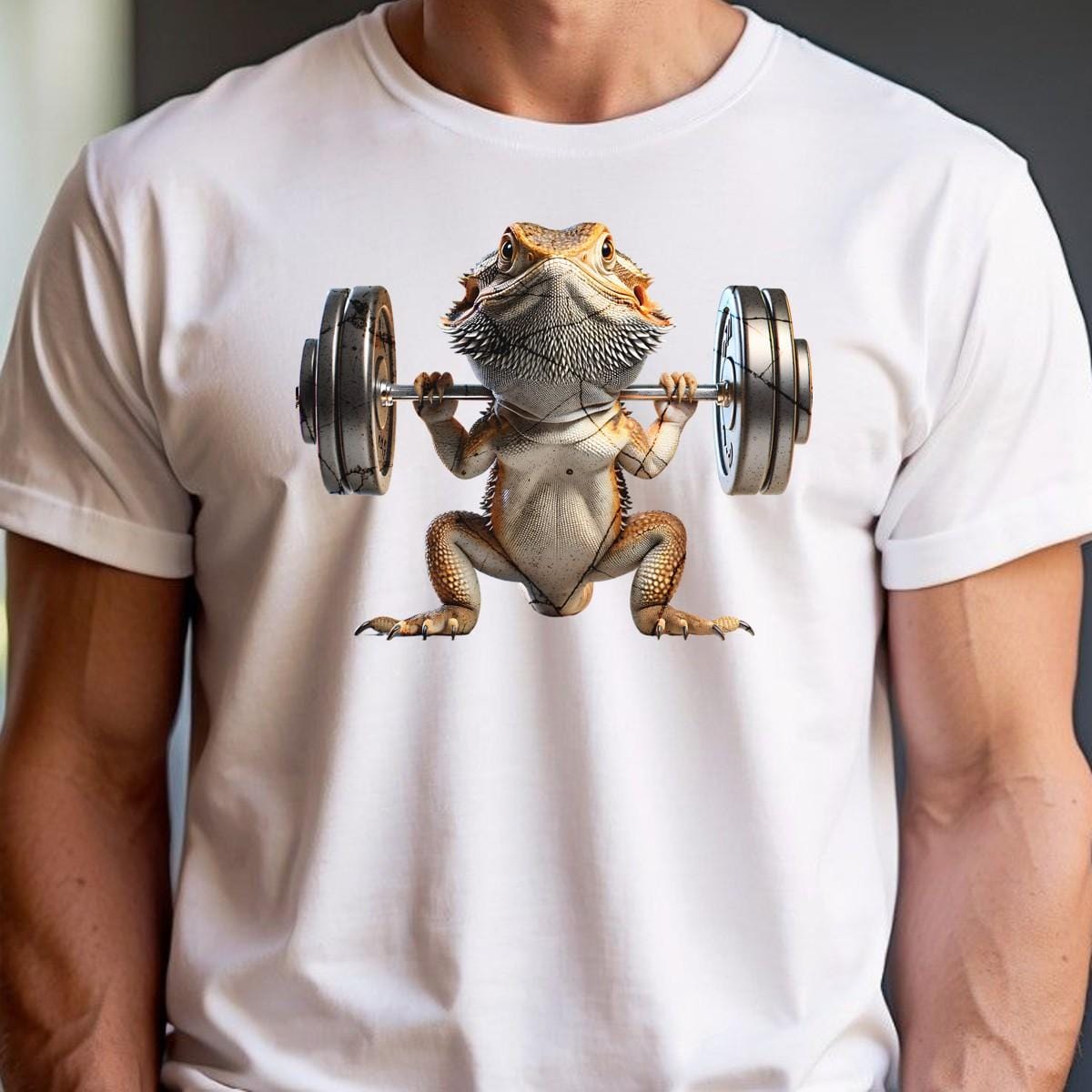 "Gym t-shirt featuring a vibrant lizard lifting weights, showcasing strength and individuality, ideal for gym enthusiasts and reptile lovers."