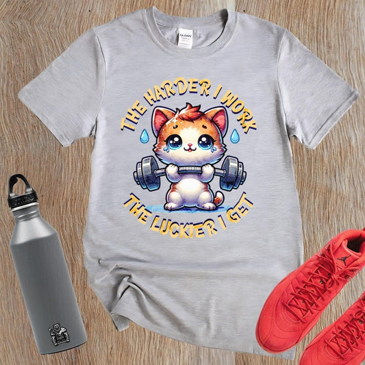 "Vibrant gym T-shirt featuring a determined kitty lifting weights, inspiring fitness enthusiasts with playful motivation for workouts."