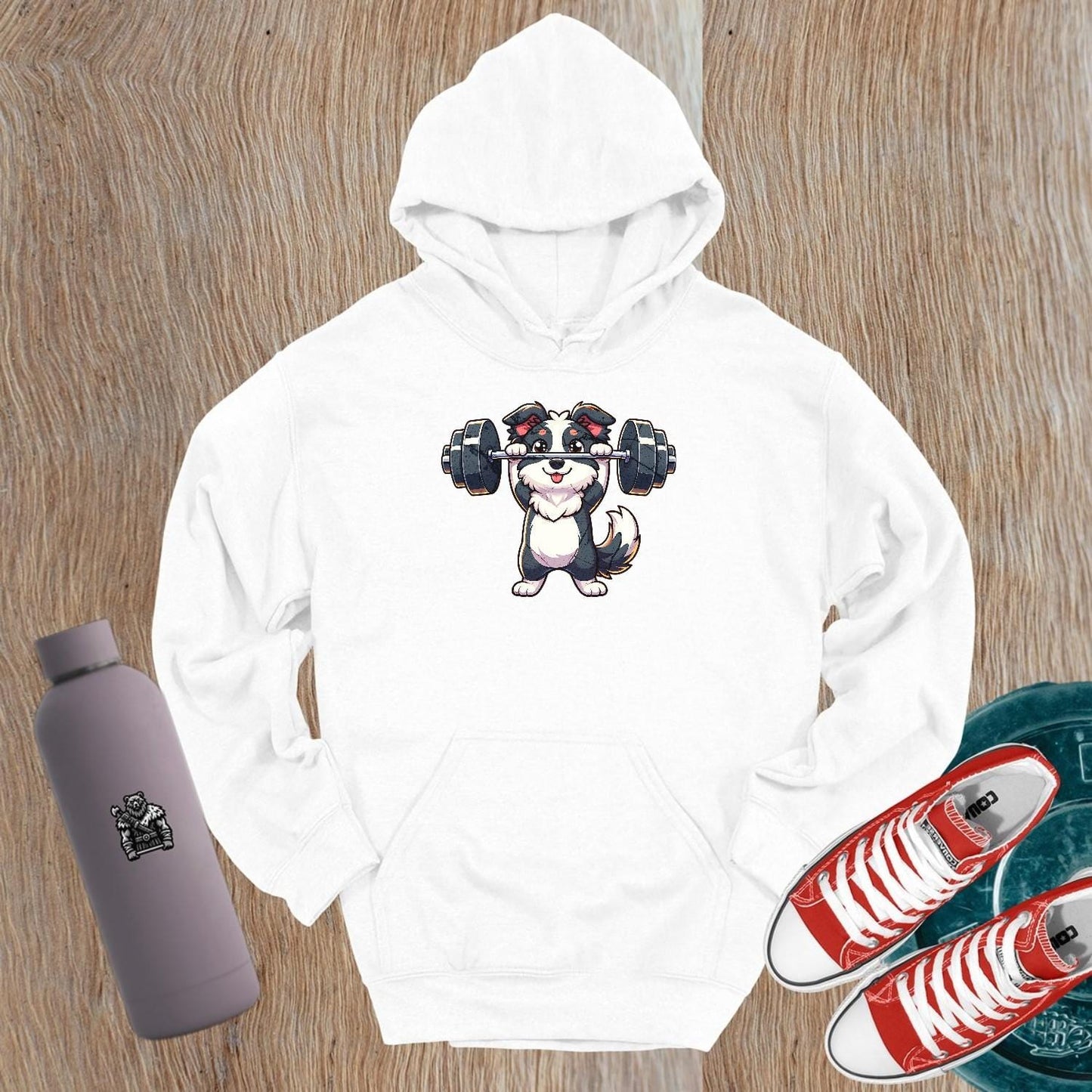 "Vibrant hoodie featuring an adorable lifting puppy, perfect for gym enthusiasts and dog lovers, blending comfort and playful style."