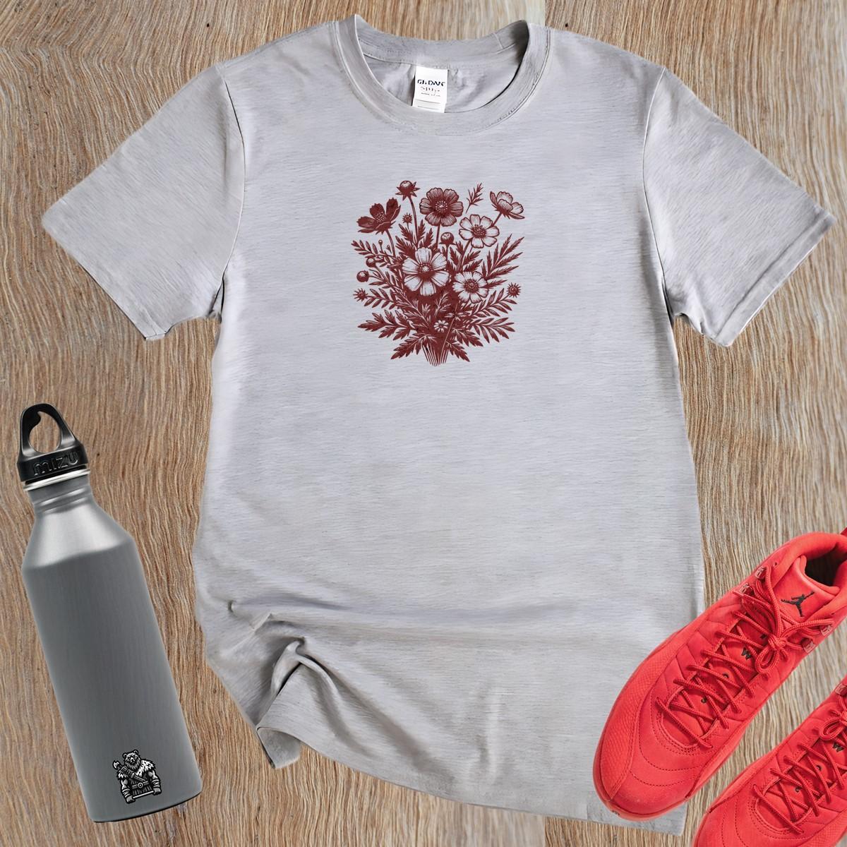 "Floral gym T-shirt featuring vibrant blooms on a sleek black background, perfect for workouts or casual outings. Stylish fitness wear."