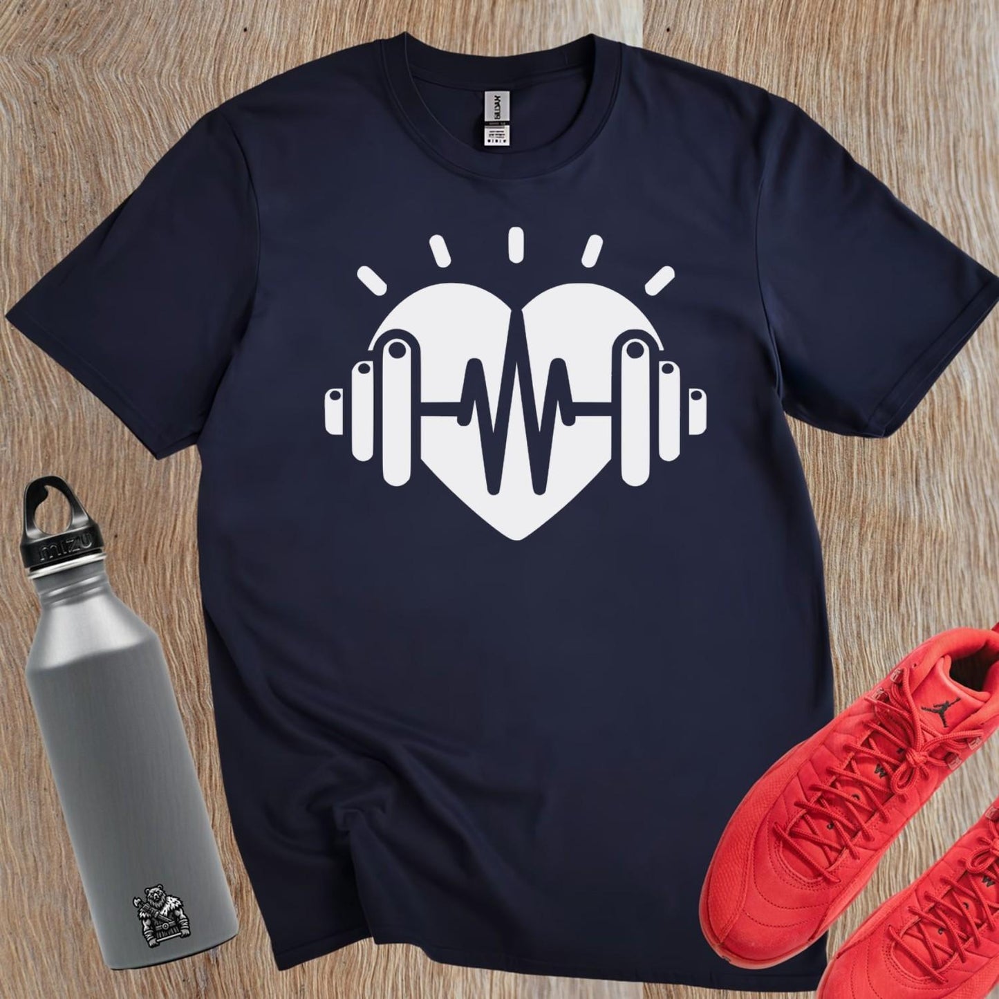 Dynamic gym T-shirt featuring a heart and weights graphic, symbolizing fitness dedication, perfect for workouts and casual wear.