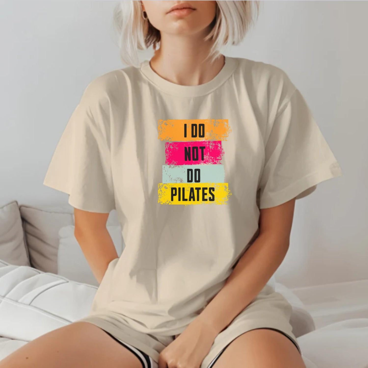 Alt text: "Black 'I Do Not Do Pilates' gym t-shirt, featuring bold white lettering, perfect for fitness enthusiasts who love weightlifting."