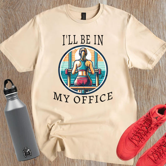 Alt text: "Stylish 'I'll Be in My Office' gym T-shirt featuring a motivational graphic, perfect for workouts and casual outings, embodies fitness passion."