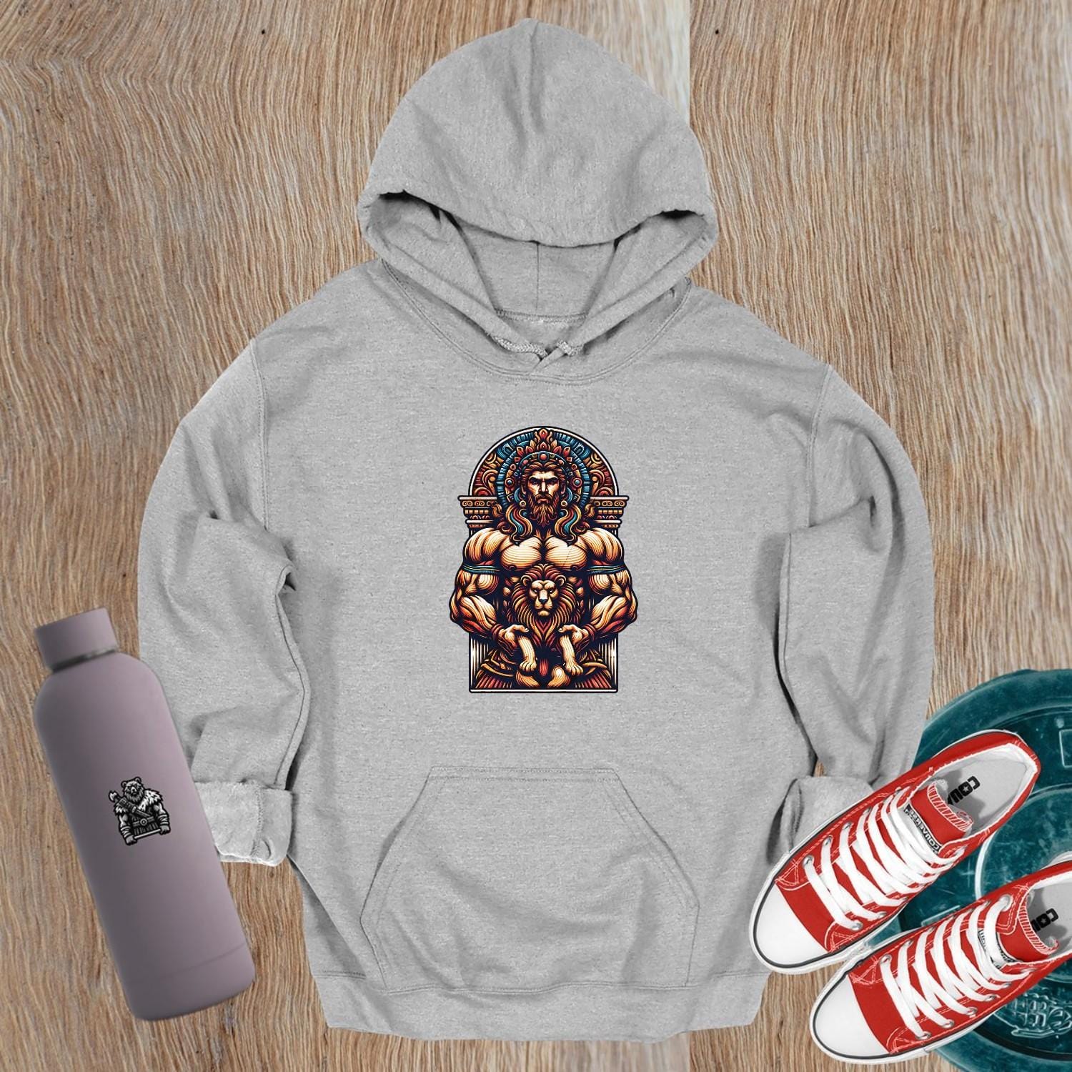 "Graphic gym hoodie featuring a muscular figure and fierce lion design, symbolizing strength, courage, and resilience for workout wear."