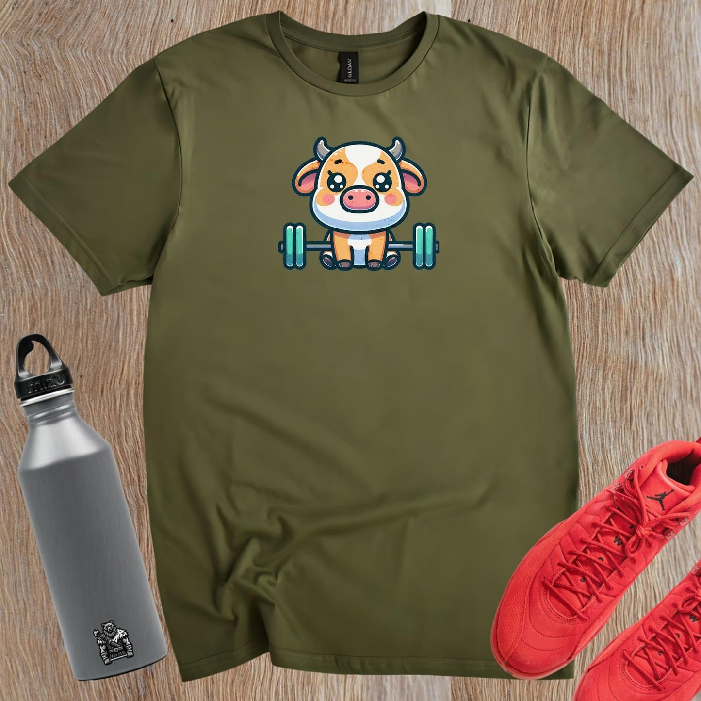 "Adorable gym T-shirt design featuring a playful weightlifting cow, perfect for workouts and leisure. Unique fitness apparel for fun."