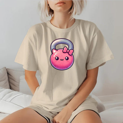 Alt text: "Kawaii Kettlebell T-shirt featuring a cute pink kettlebell with a bow, perfect for gym workouts and stylish casual wear."
