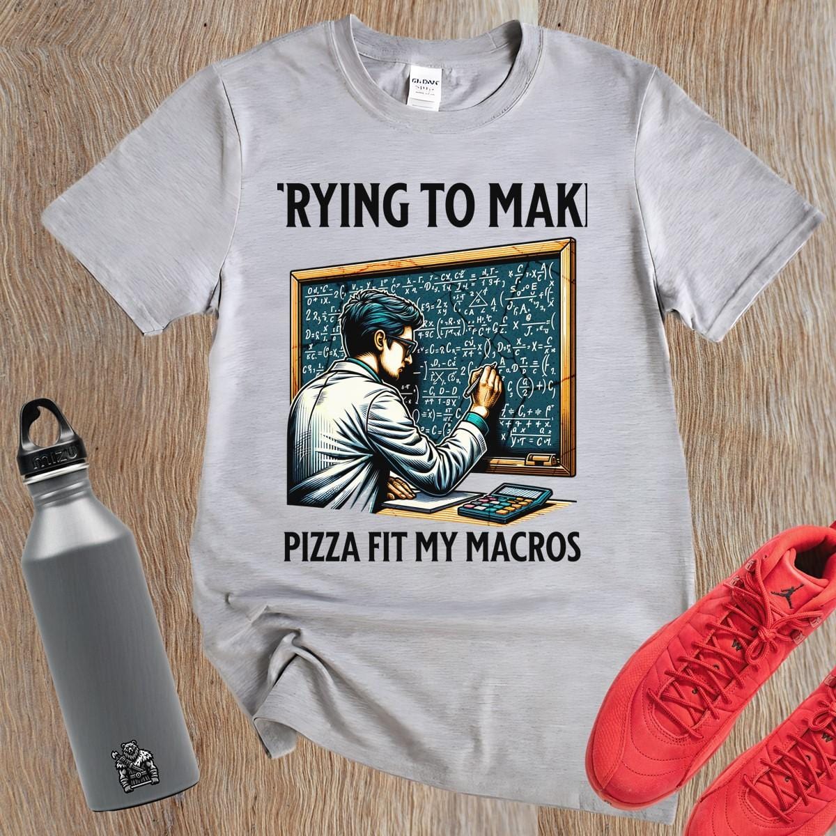 Alt text: "Humorous gym T-shirt design featuring a lab-coated character calculating pizza macros, perfect for fitness enthusiasts who love food."