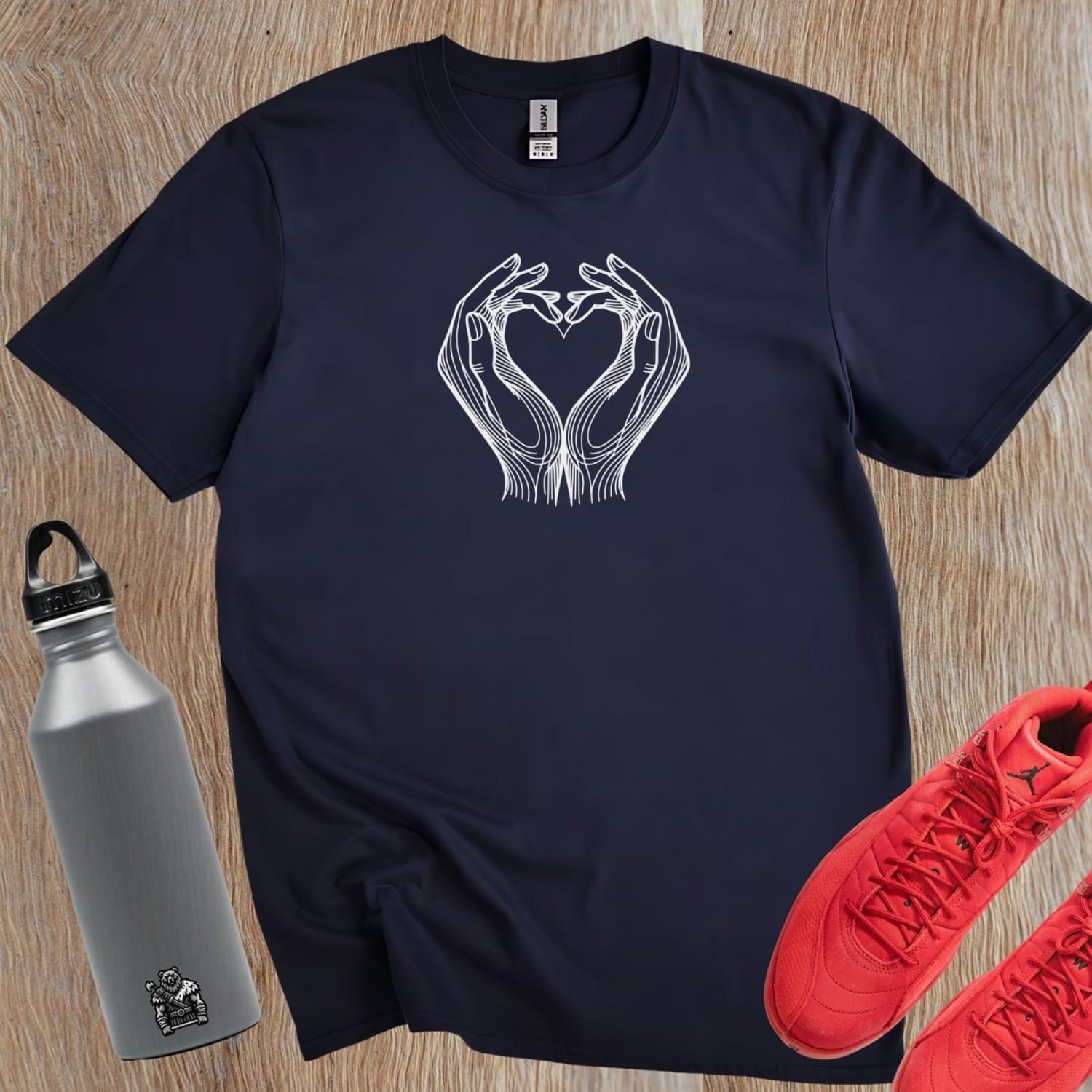 Alt text: "Gym t-shirt featuring a heart-shaped hands design, symbolizing strength, love, and community, perfect for workouts and casual wear."