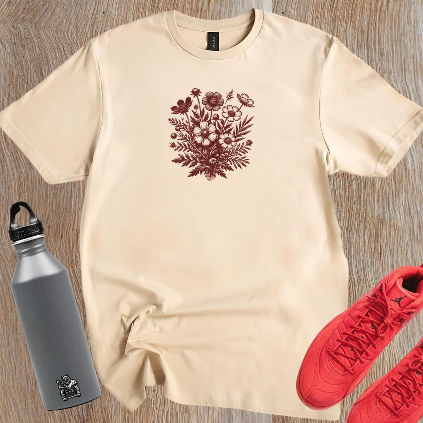 "Floral gym T-shirt featuring vibrant blooms on a sleek black background, perfect for workouts or casual outings. Stylish fitness wear."