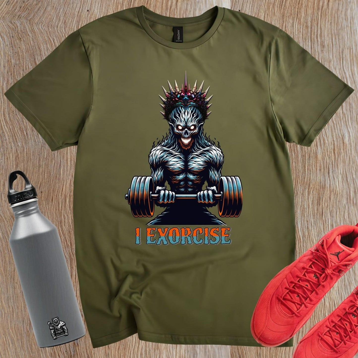 Alt text: "Bold 'I Exorcise' t-shirt featuring a fierce skeletal creature lifting weights, perfect for gym enthusiasts and fitness lovers."