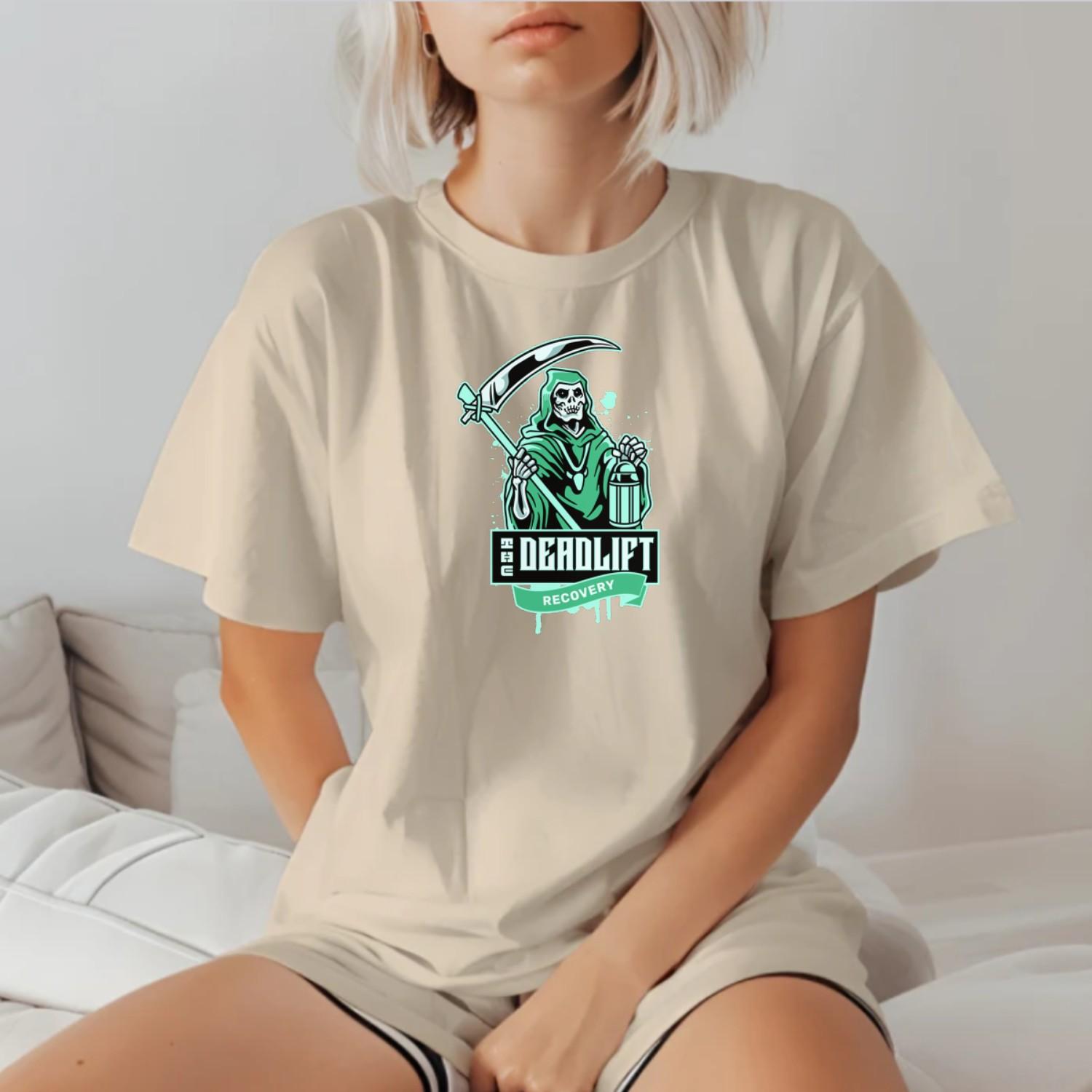 "Graphic gym t-shirt featuring a powerful Grim Reaper design, symbolizing strength and resilience in deadlift recovery for fitness enthusiasts."