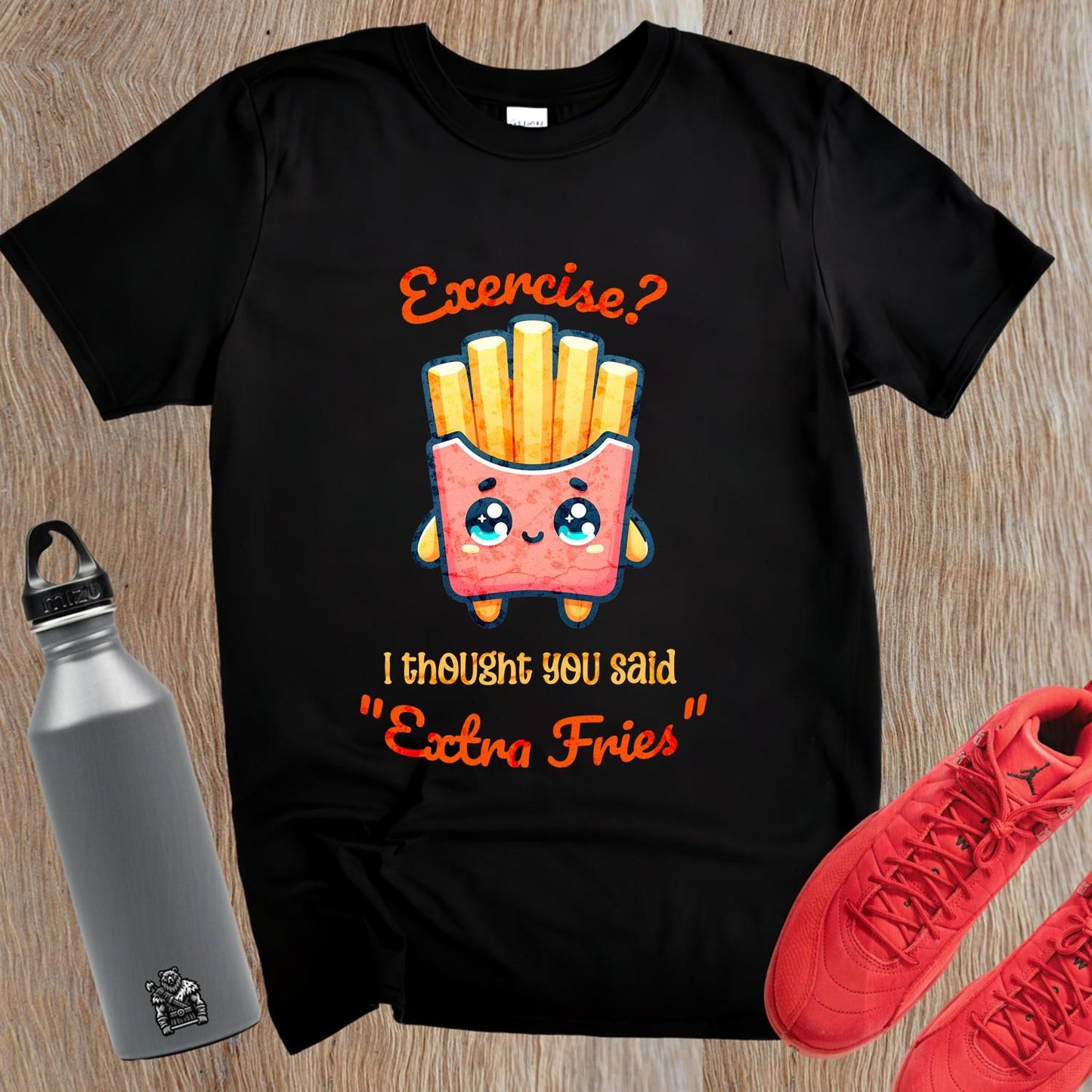 Alt text: "Humorous gym T-shirt featuring the phrase 'Exercise? I thought you said Extra Fries' in playful typography. Ideal for fitness lovers."