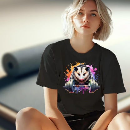 "Vibrant gym T-shirt featuring a playful opossum lifting weights, blending fitness and fun, perfect for workout enthusiasts."