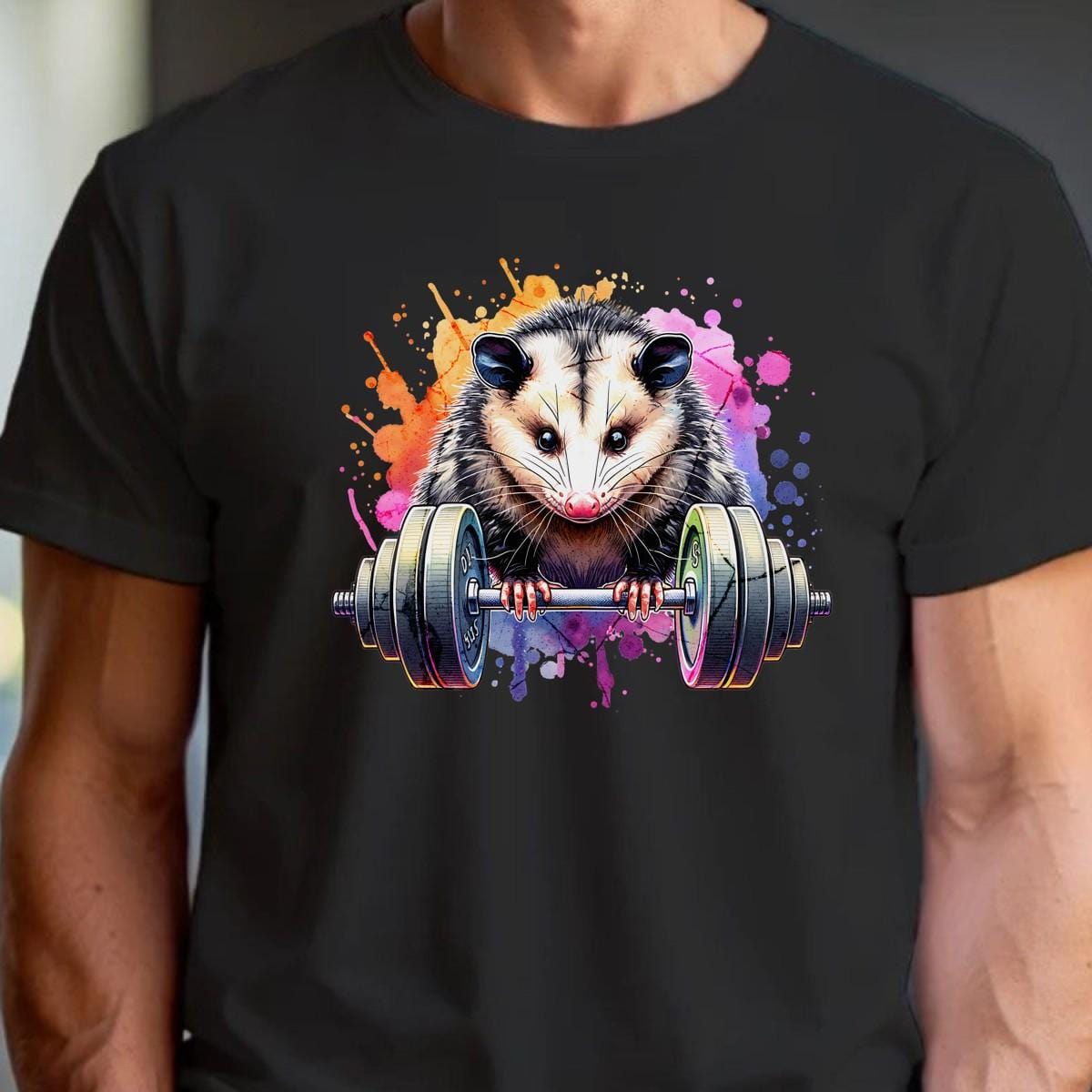 "Vibrant gym T-shirt featuring a playful opossum lifting weights, blending fitness and fun, perfect for workout enthusiasts."