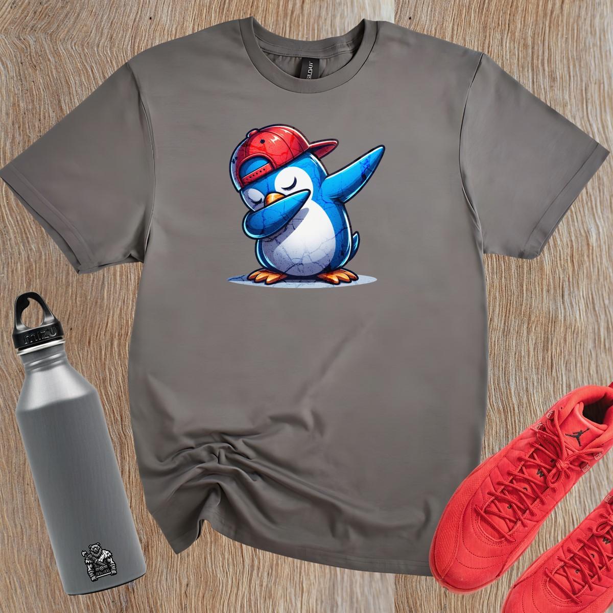Alt text: "Vibrant gym T-shirt featuring a playful penguin wearing a cap, perfect for fitness enthusiasts who value comfort and style."