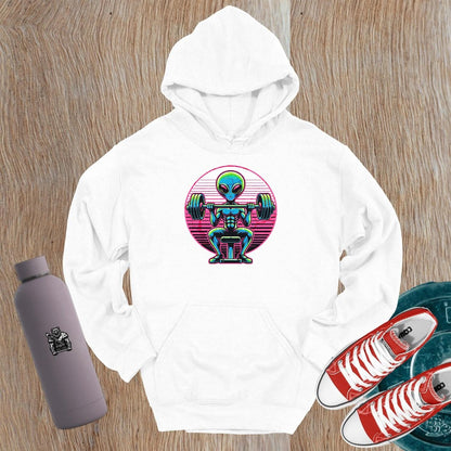 "Vibrant Alien Muscle Hoodie featuring a determined extraterrestrial lifting weights, perfect for gym enthusiasts and fitness lovers."