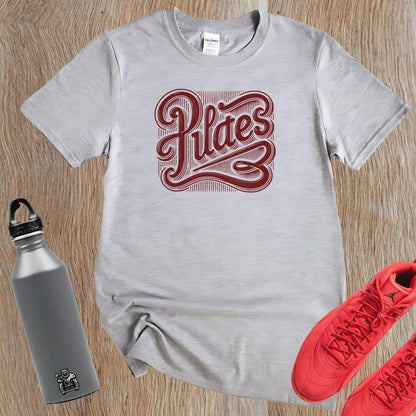 Alt text: "Stylish Pilates T-shirt featuring a bold, intricate graphic embodying wellness and discipline, perfect for fitness enthusiasts."