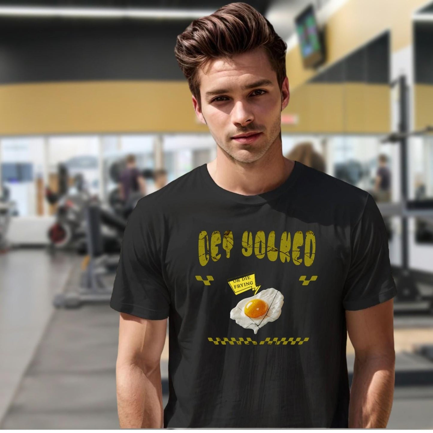"Bold 'Get Yolked' T-shirt featuring a playful fried egg design, perfect for gym workouts or casual outings. Fitness fashion statement."