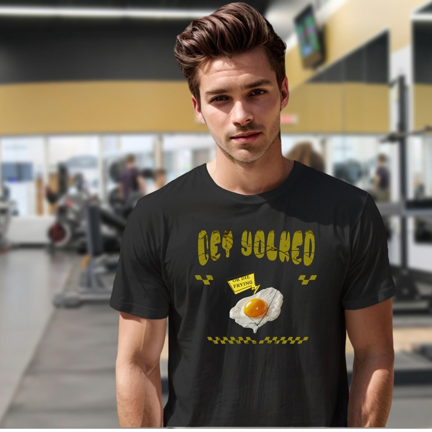 "Bold 'Get Yolked' T-shirt featuring a playful fried egg design, perfect for gym workouts or casual outings. Fitness fashion statement."