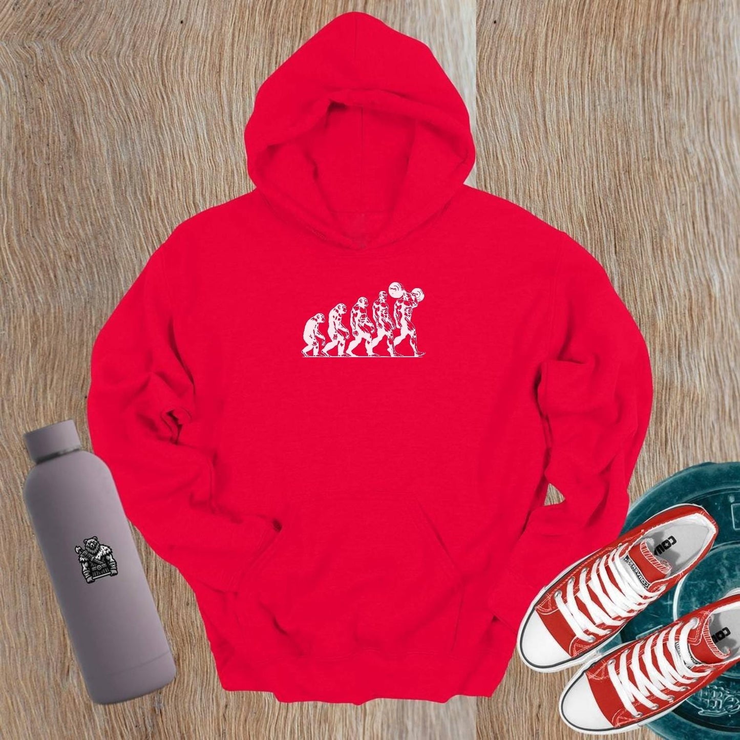 "Men's Evolution Hoodie: a stylish gym hoodie showcasing a dynamic design symbolizing strength and growth, ideal for workouts or casual wear."