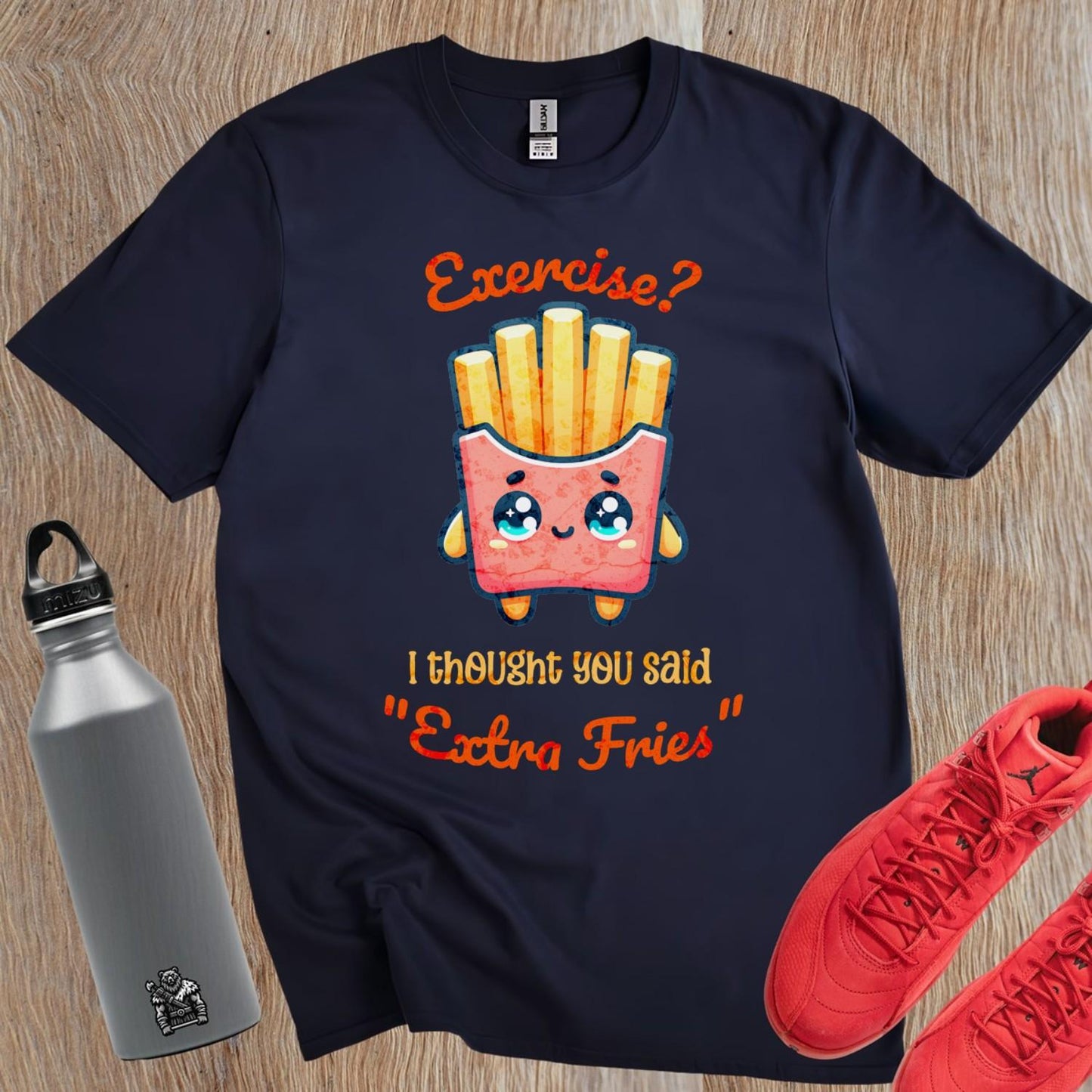 Alt text: "Humorous gym T-shirt featuring the phrase 'Exercise? I thought you said Extra Fries' in playful typography. Ideal for fitness lovers."