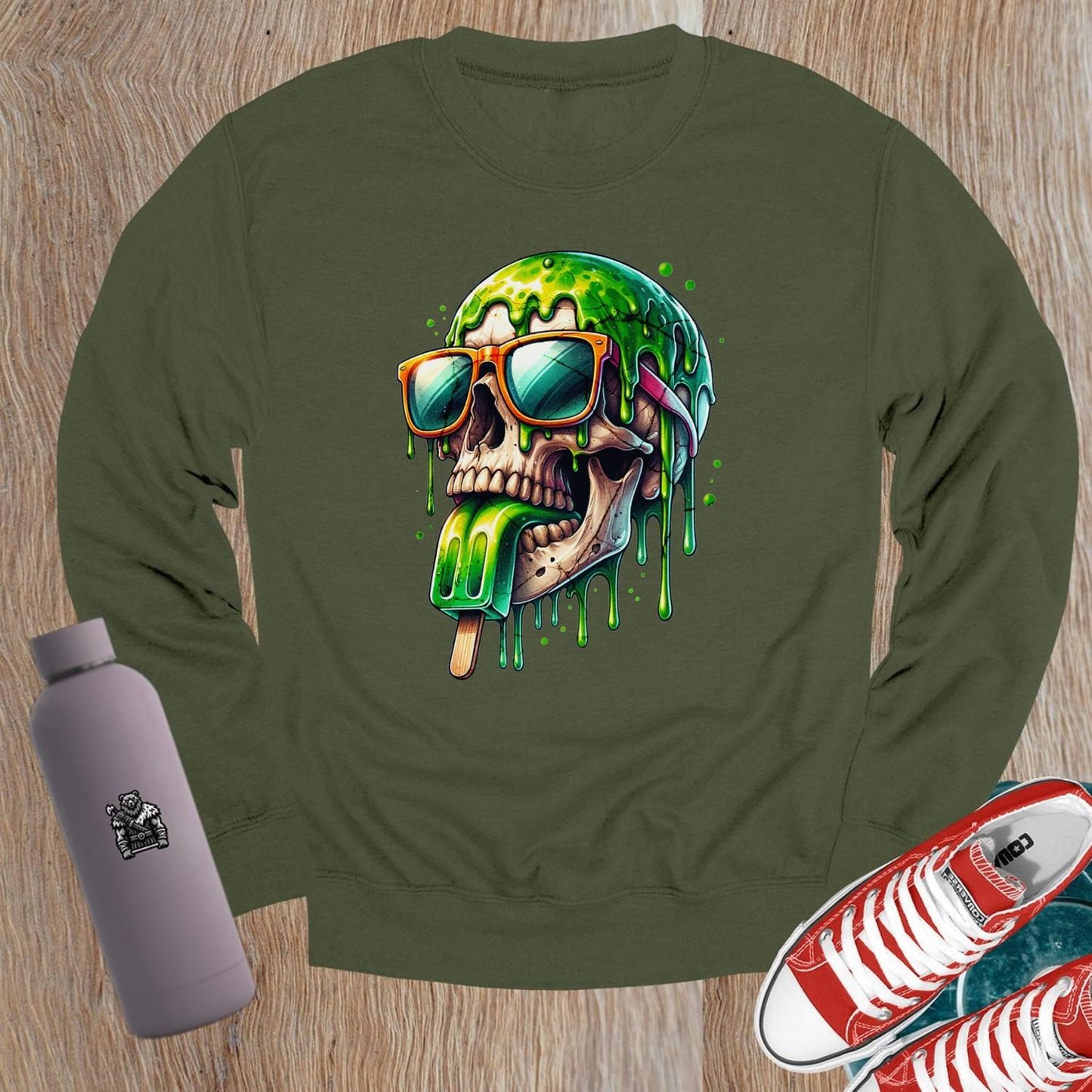 "Edgy crewneck sweatshirt with skull graphic in sunglasses and dripping popsicle, perfect for gym and casual wear, relaxed fit."