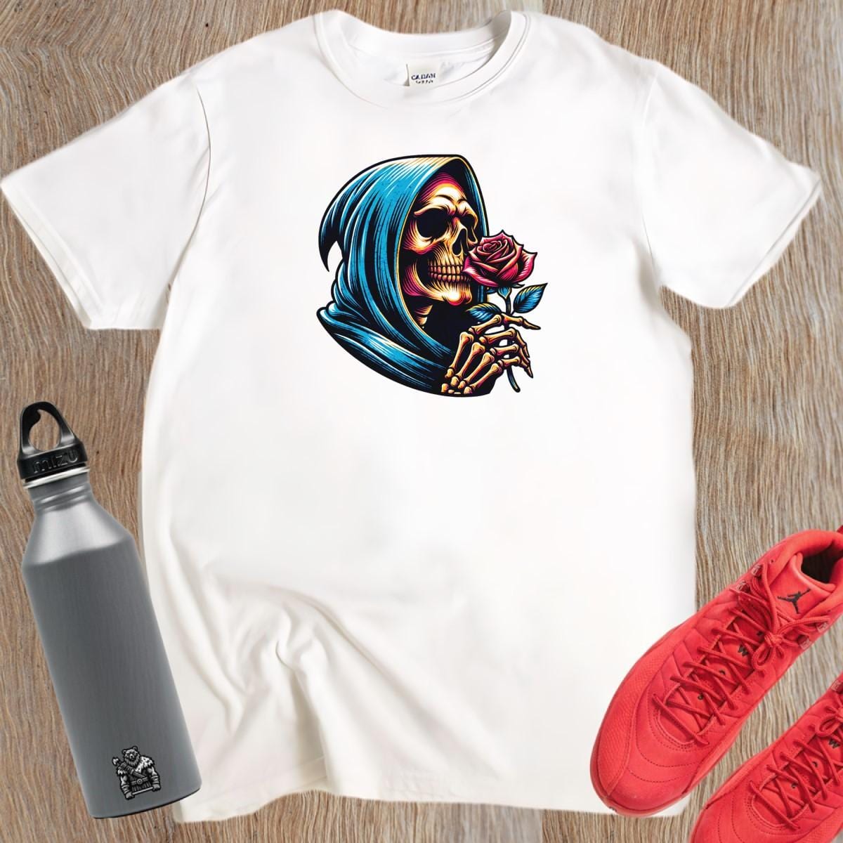 "Edgy gym T-shirt featuring a striking skeleton cradling a rose, combining elegance and strength for bold workout expression."